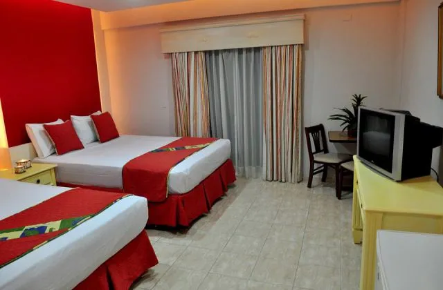 Hotel Casino Flamboyan Punta Cana habitacion 2 grandes camas