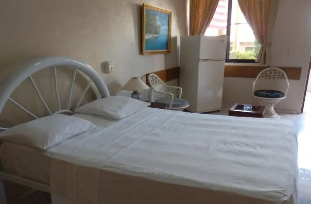 Hotel Garant Suites Boca Chica habitacion 1 grande cama